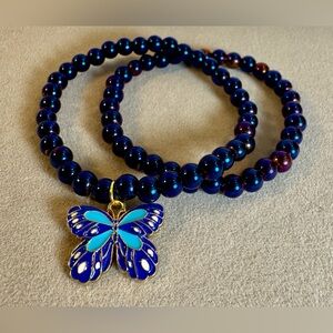 Blue Stretch Bracelet Stack set, one with Butterfly Pendant